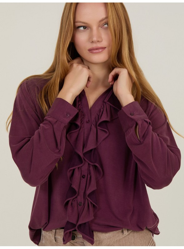 Blusa de cupro con volantes