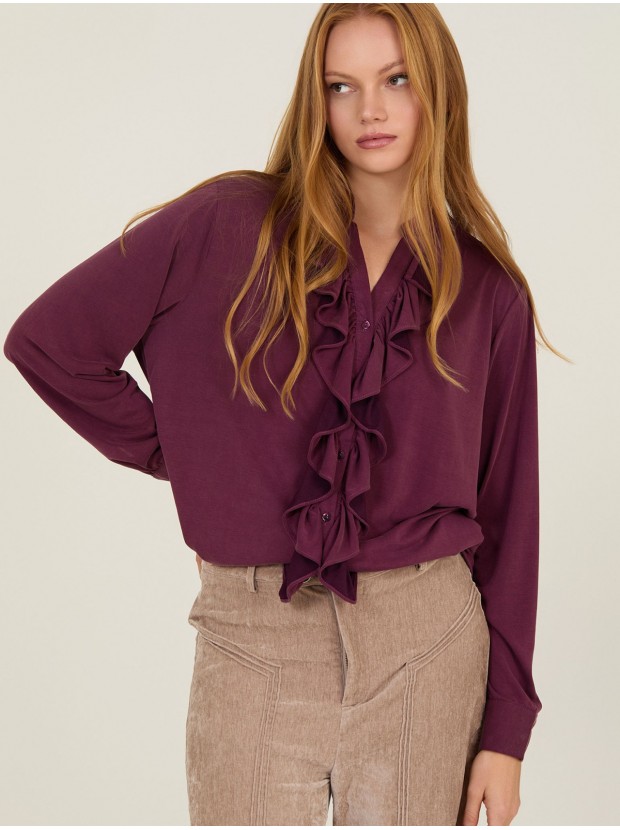 Blusa de cupro con volantes