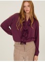Blusa de cupro con volantes