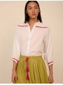 Blusa con fornituras