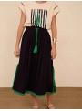 Falda midi con fornituras