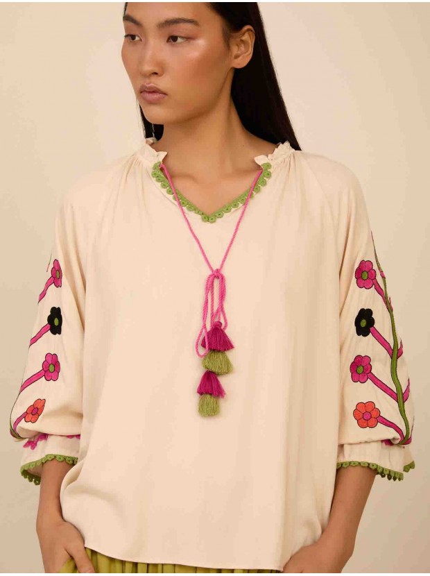 Blusa con mangas