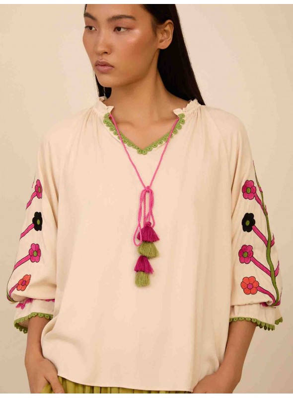 Blusa con mangas