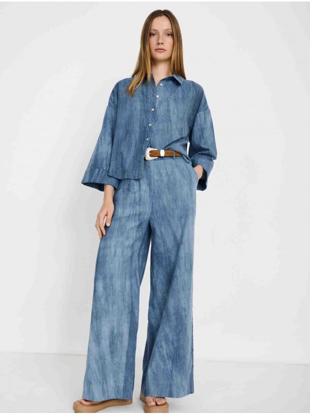 Pantalón desgastado pliegues