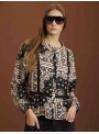 Blusa con ribete