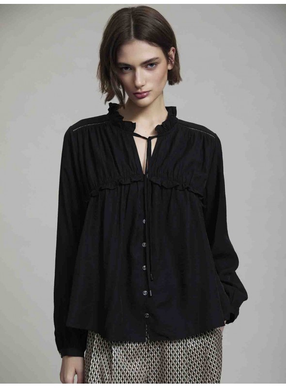 Blusa fluida de volantes
