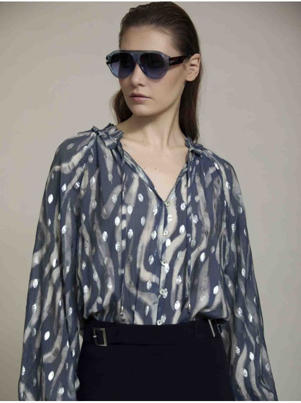 Blusa estampada con volantes