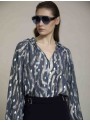 Blusa estampada con volantes