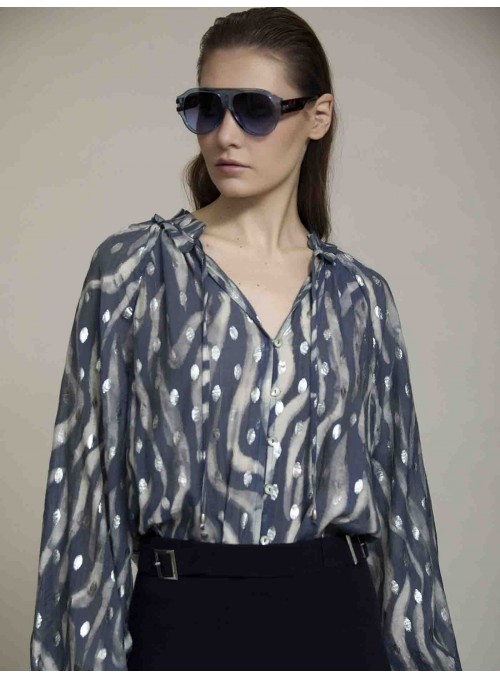 Blusa estampada con volantes